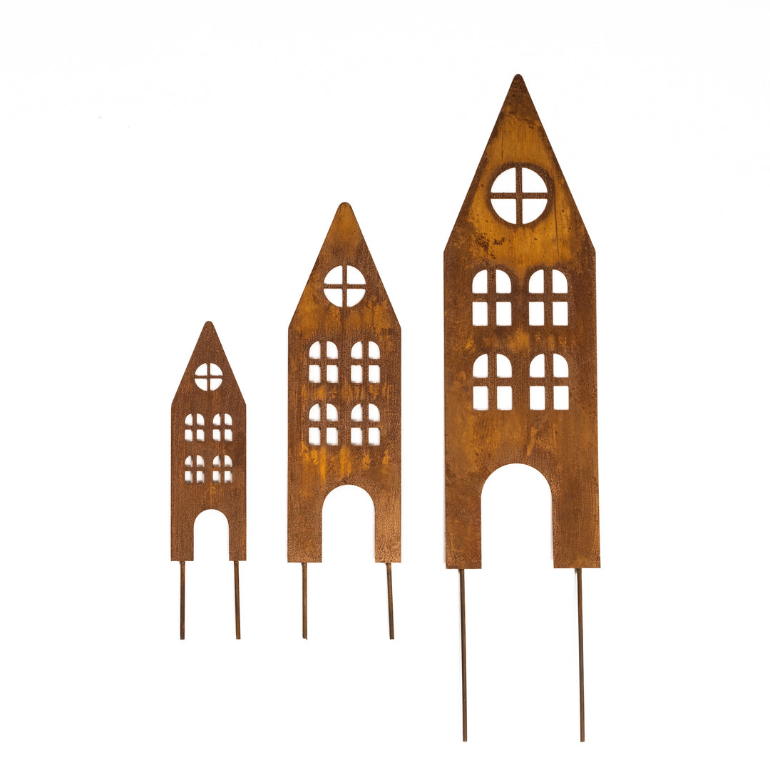 Rusty metal garden stakes (houses)