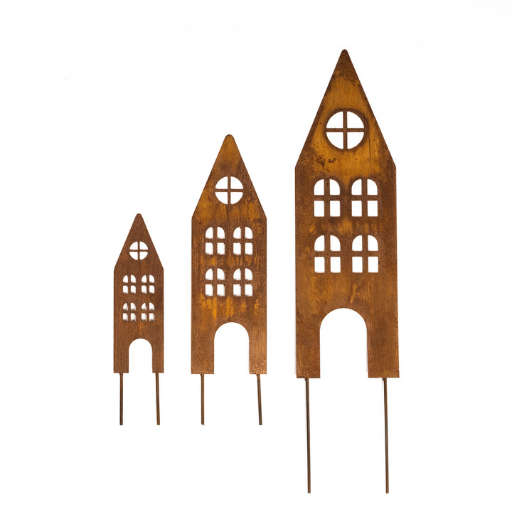 Rusty metal garden stakes (houses)
