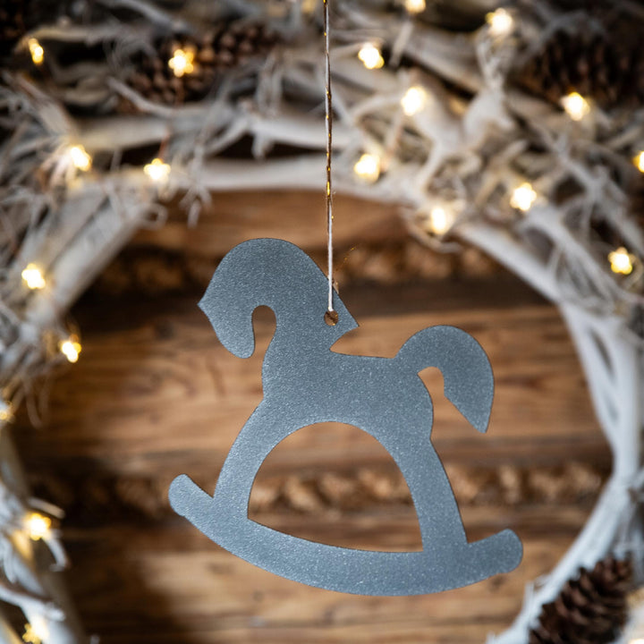 Weihnachtliches Schaukelpferd aus Metall – Tischdekoration