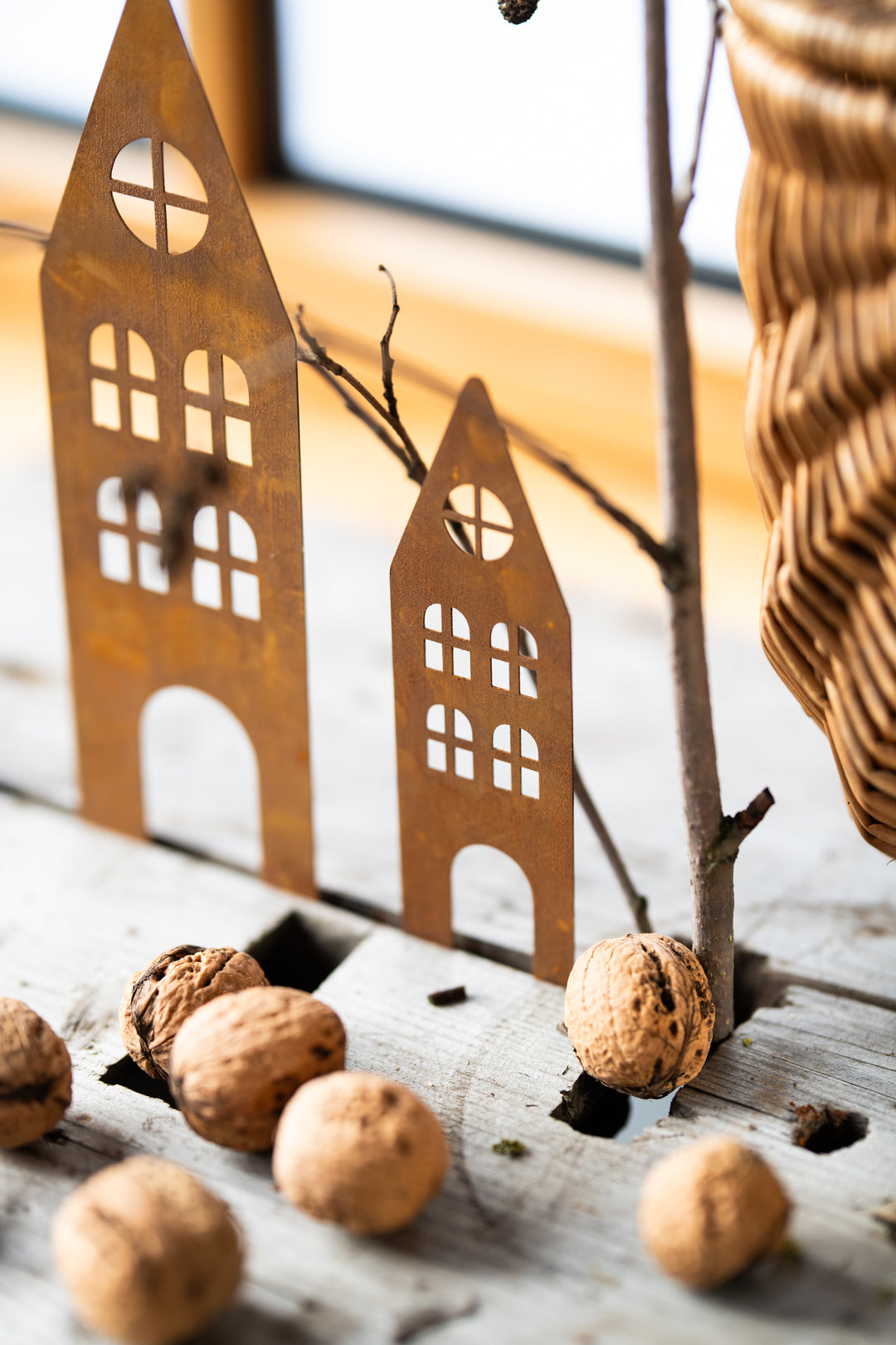 Rusty metal garden stakes (houses)