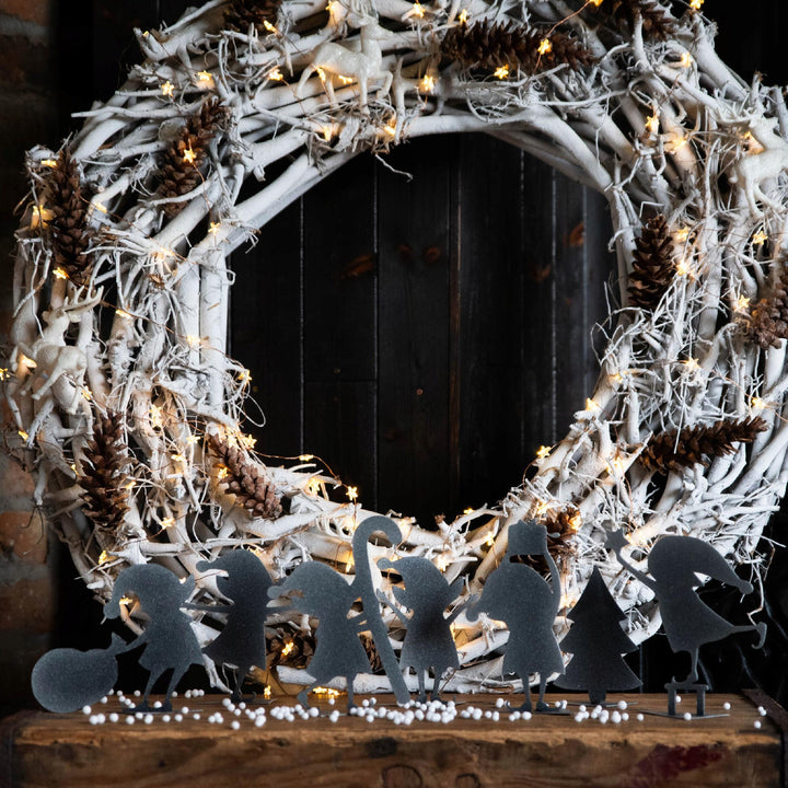Weihnachtlicher Gnom aus Metall – dekorative Tischfigur